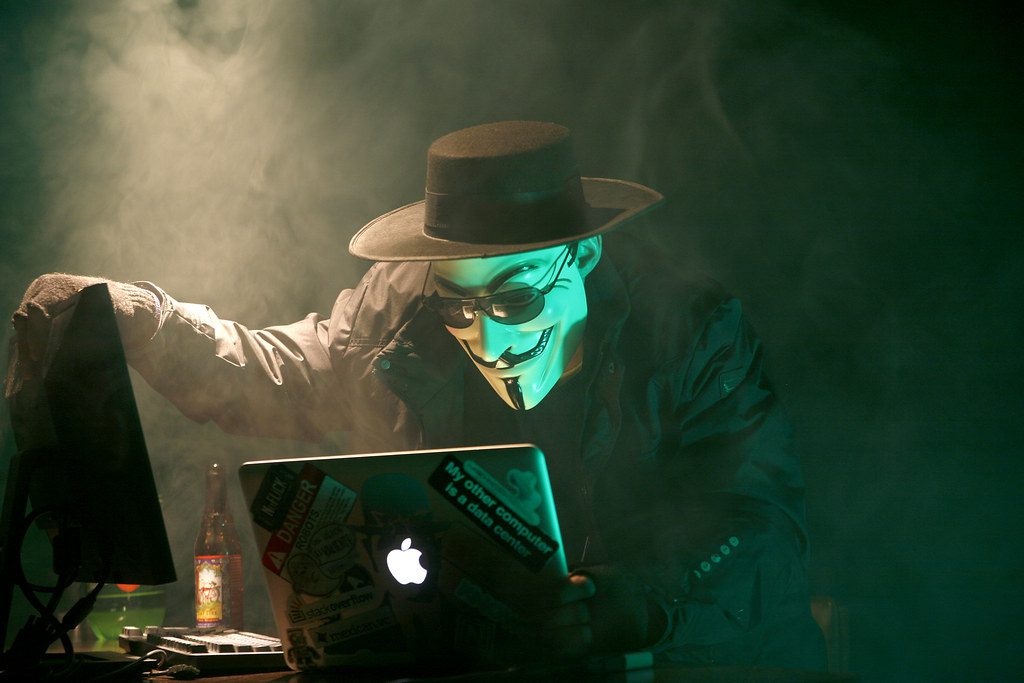 "Anonymous Hacker" by dustball (licensed under CC BY-NC 2.0)