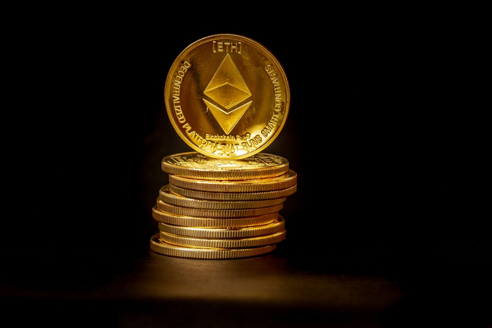 A pile of Ethereum coins that have a gold color that is currently popular and has an increasing value compared to the US Dollar. For payment, finance, investment and economy concepts