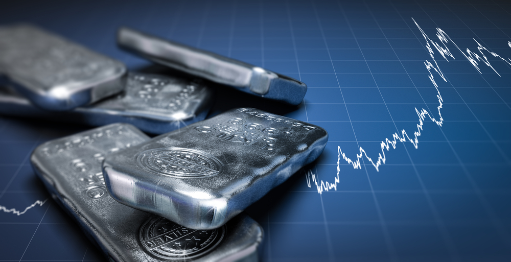 3D illustration of silver bullion bars over a blue background with growing chart. Commodities investment concept, horizontal image.