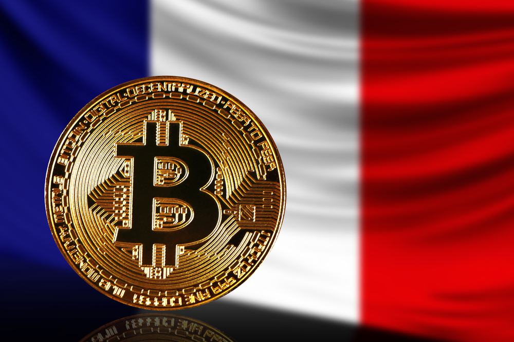 gold coin bitcoin on a background of a flag France