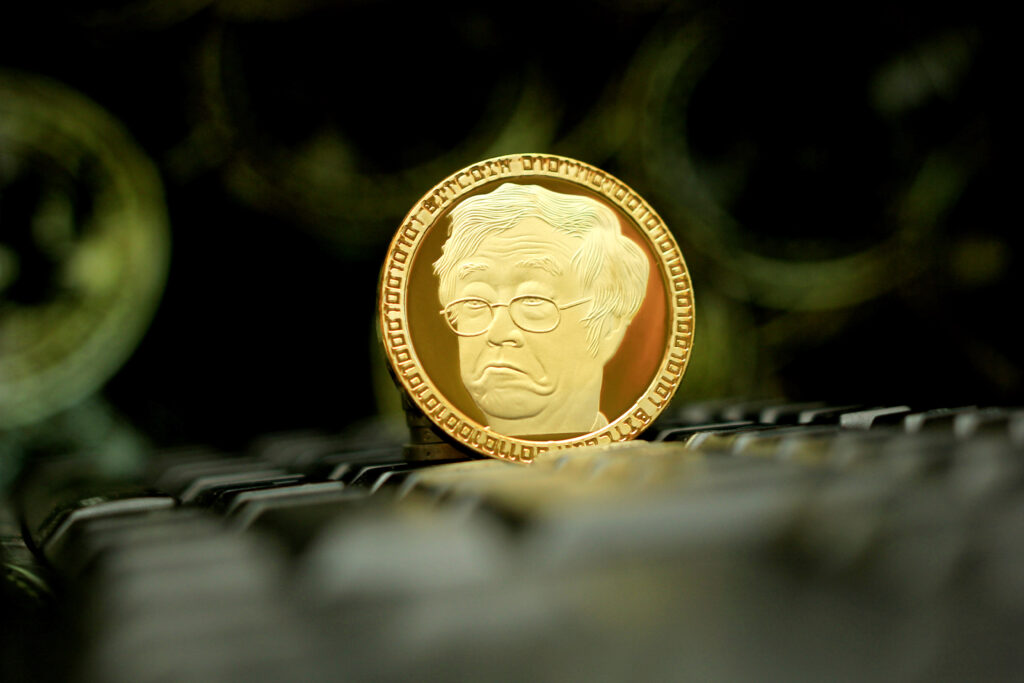 13.10.2018 Riga Latvia Golden bitcoin coin. Satoshi Nakamoto is the name used by the presumed pseudonymous person who developed bitcoin
