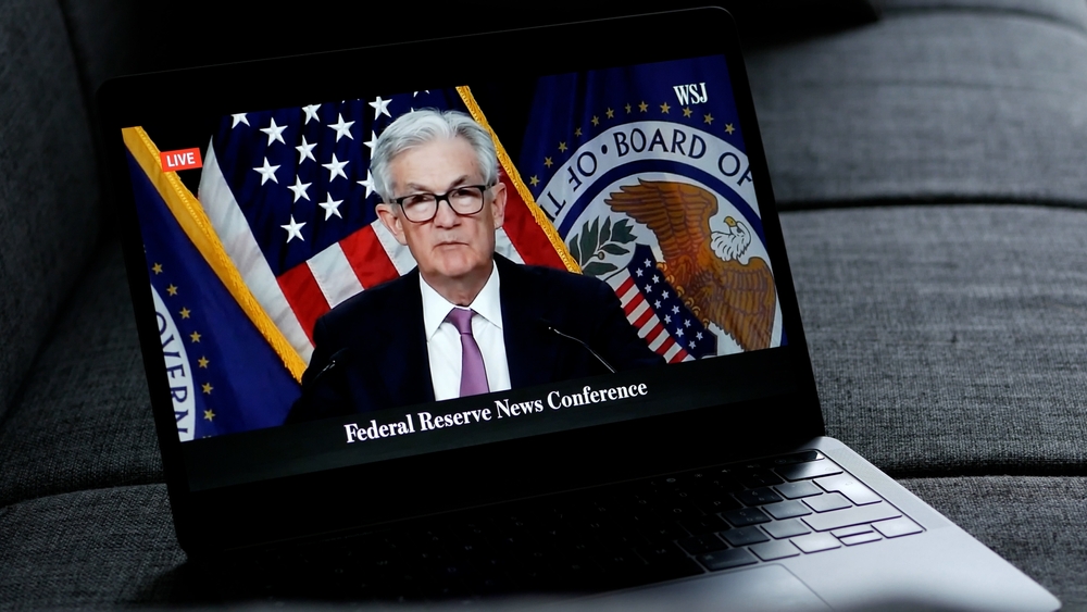 FEBRUARY 1, 2023: Fed Chair Jerome Powell Talking about Inflation, Wathing the Video on CNBC Television YouTube Channel, on a Macbook Pro